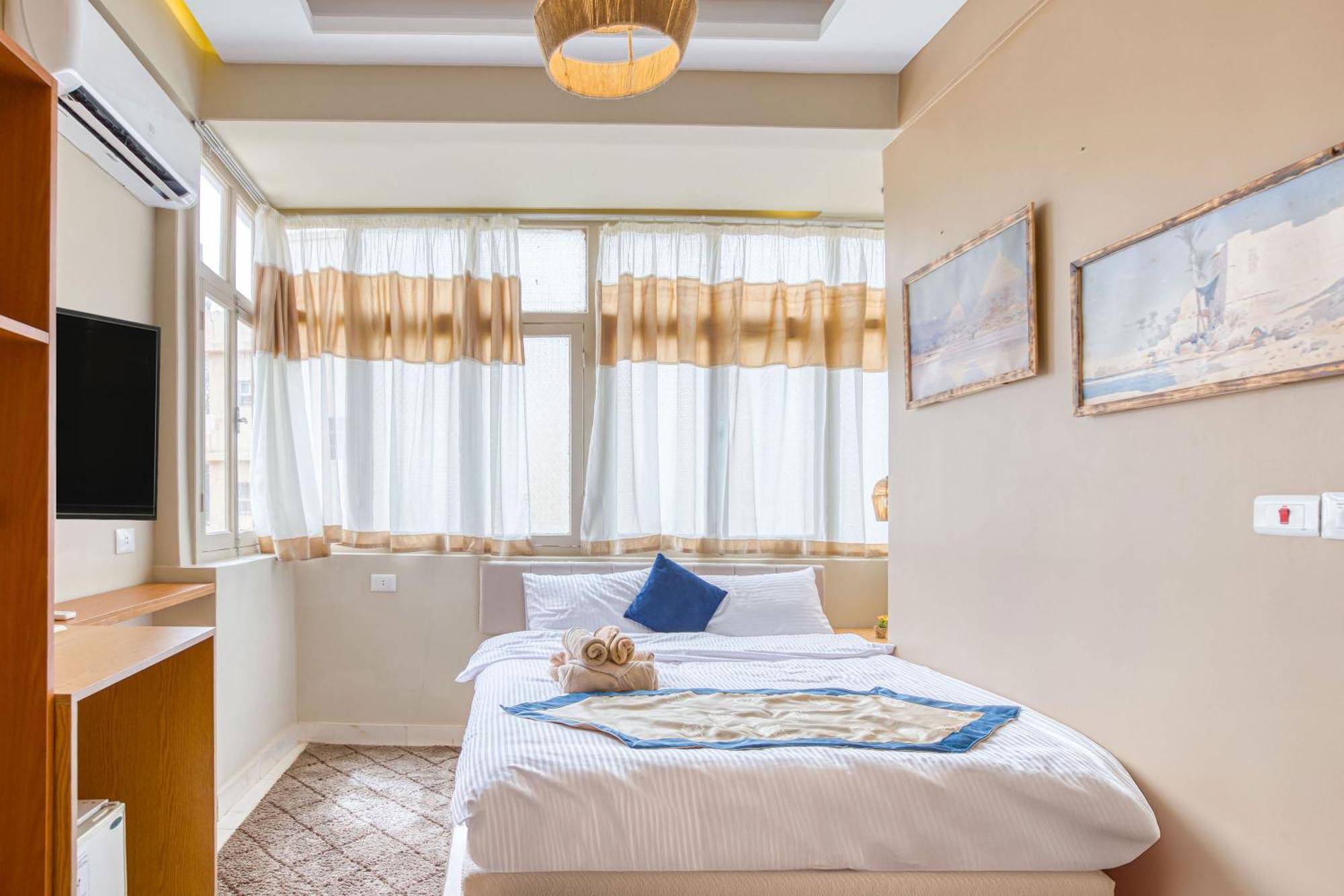 The Grand Pyramids View Hotel Kafret el-Gabal Kamer foto