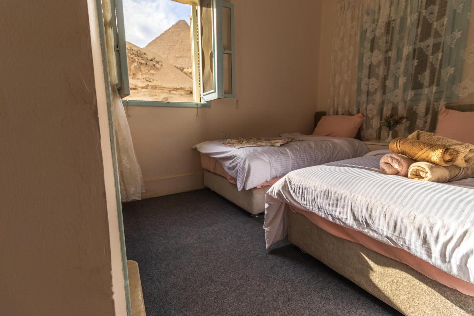 The Grand Pyramids View Hotel Kafret el-Gabal Kamer foto