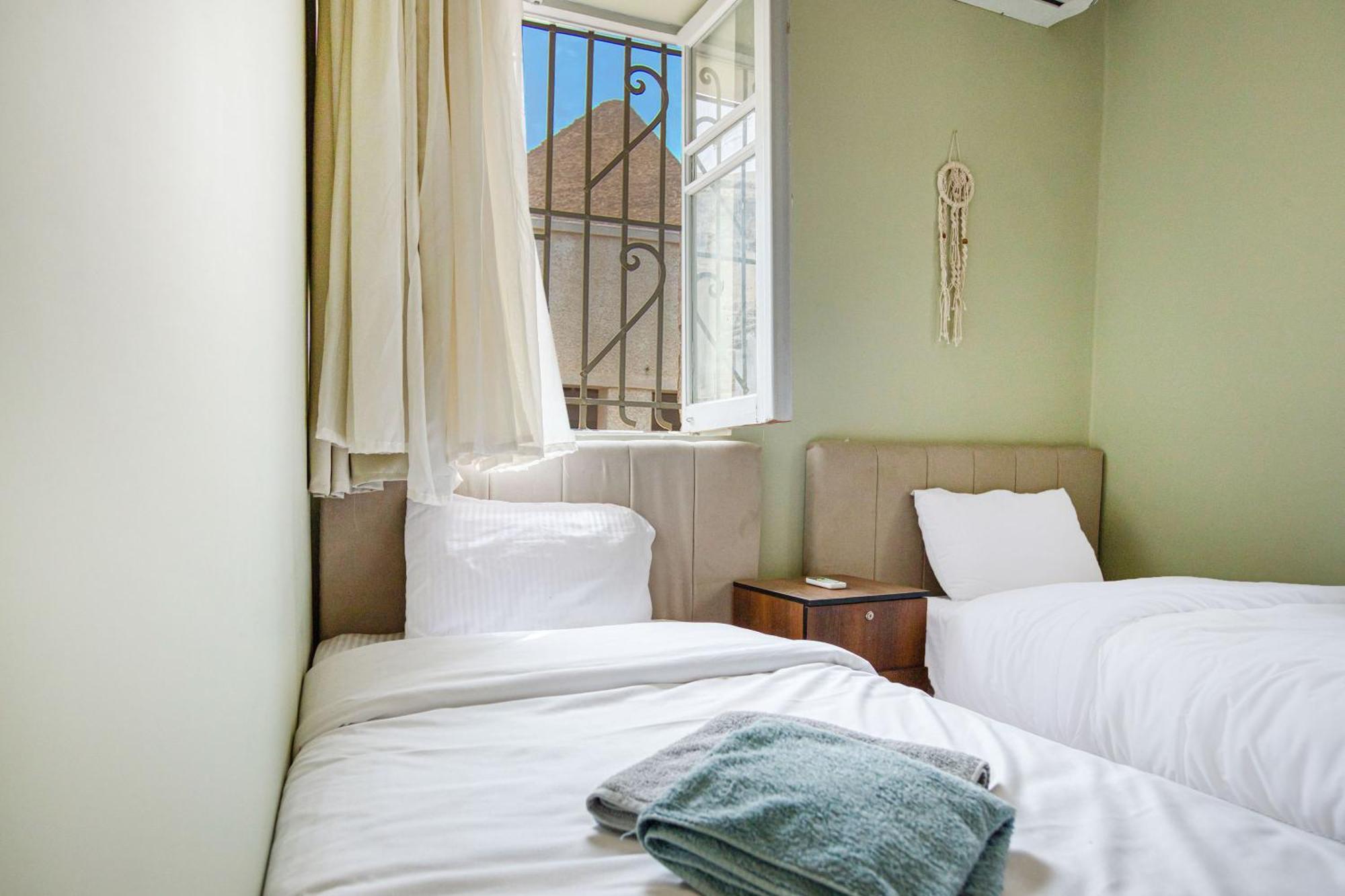 The Grand Pyramids View Hotel Kafret el-Gabal Kamer foto
