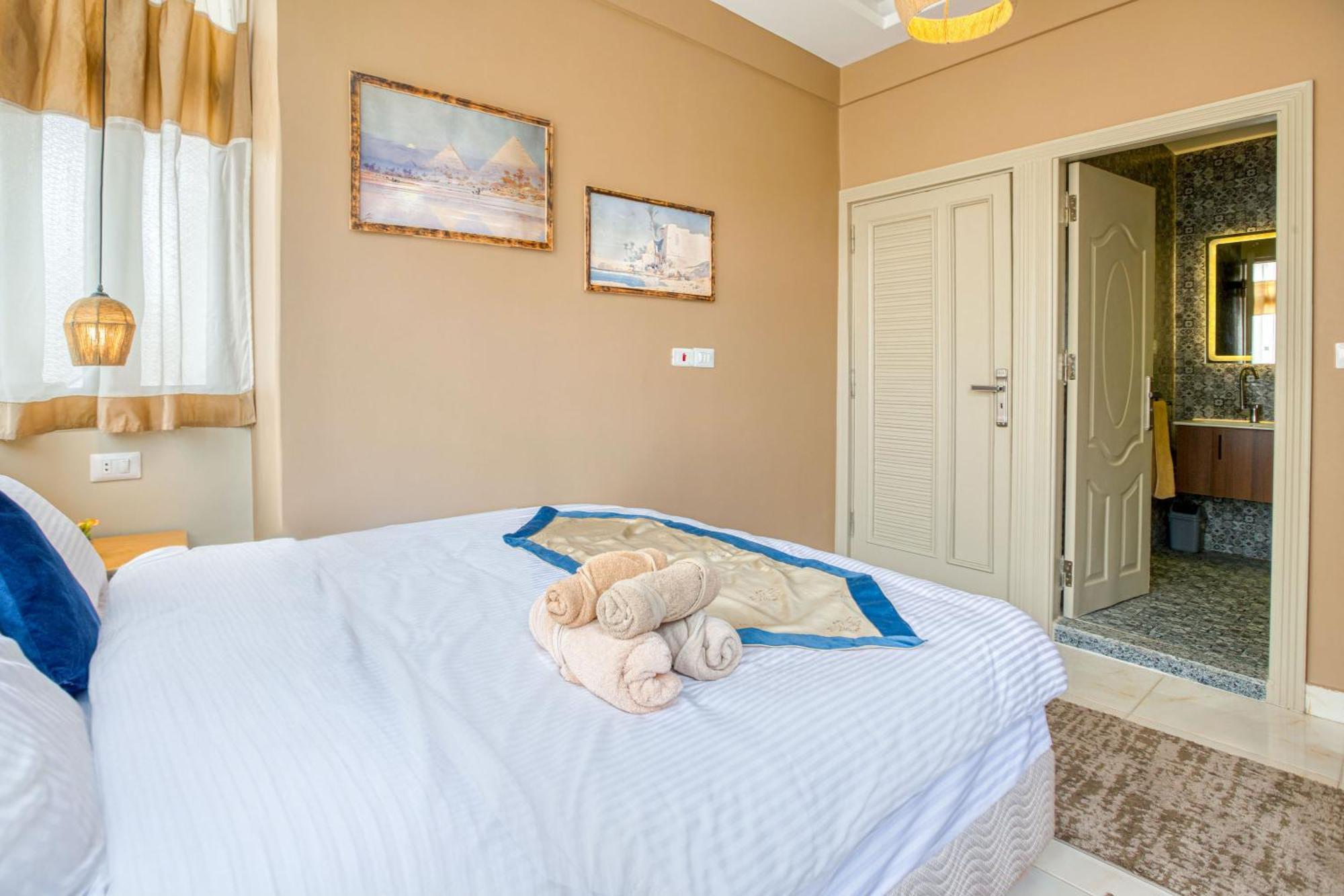 The Grand Pyramids View Hotel Kafret el-Gabal Kamer foto